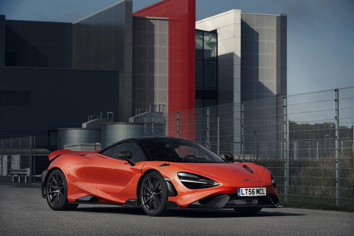 McLaren 765LT supercar parked in front of modern building