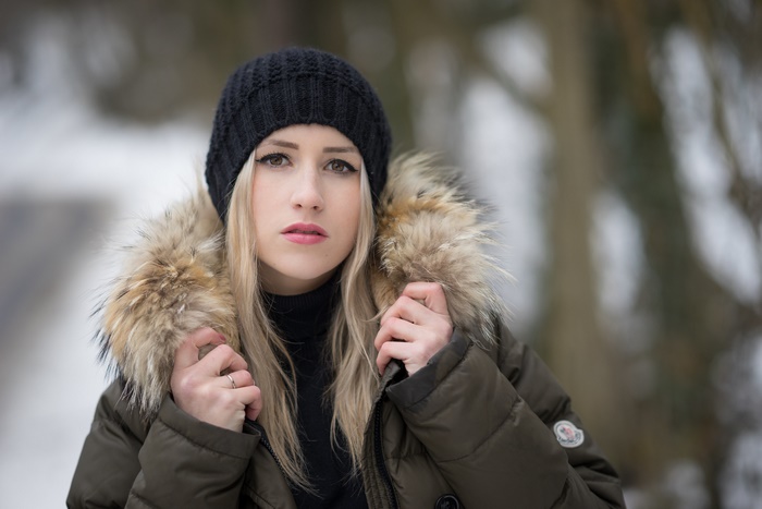 Woman in winter coat and beanie