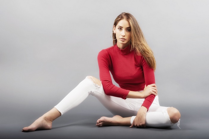 Elegant Asian Woman in Red Sweater