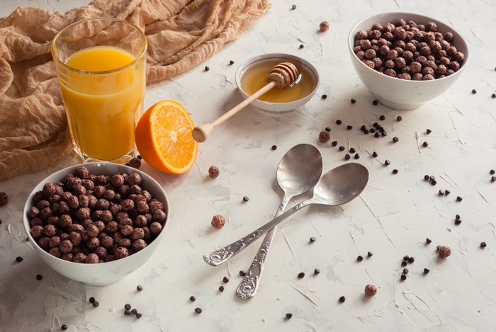 Breakfast with Cereal, Orange Juice, and Honey