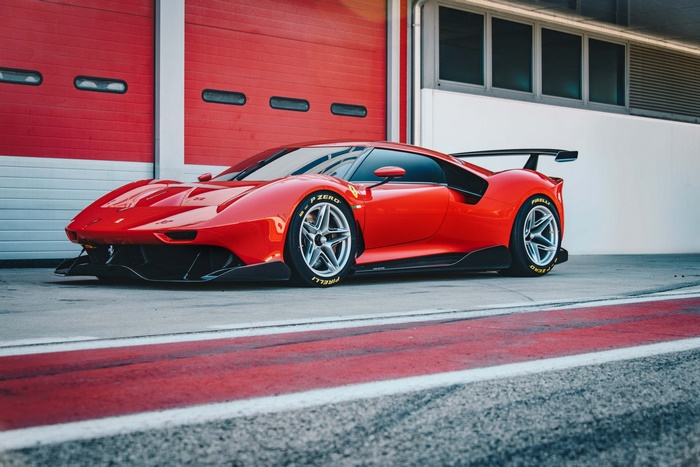 Ferrari P80/C race car in a garage
