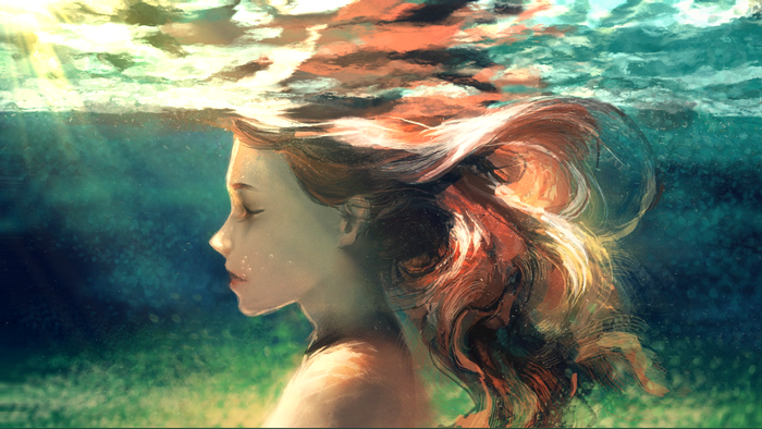 Woman underwater with flowing hair