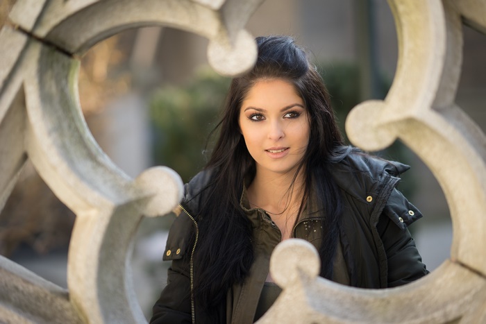 Woman with long black hair and brown eyes