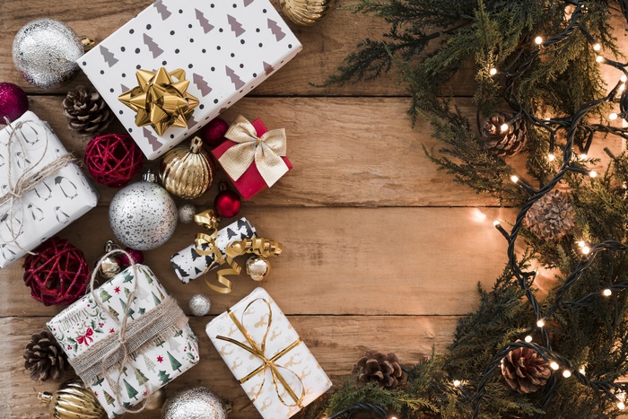 Christmas Gifts and Ornaments on Wooden Table