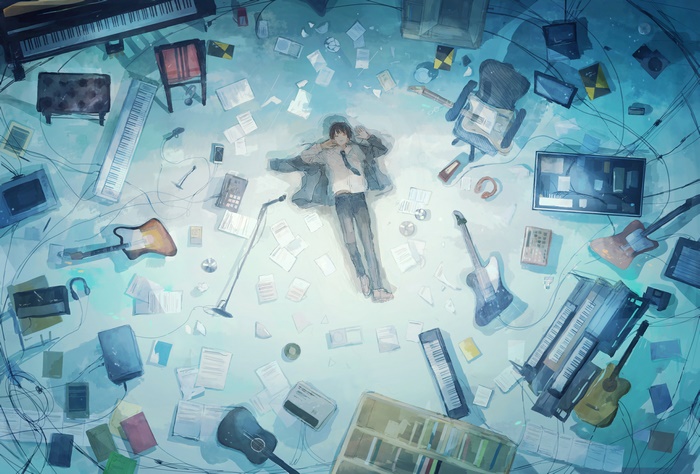 Man surrounded by musical instruments and papers
