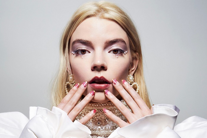 Anya Taylor-Joy with dramatic makeup and nails