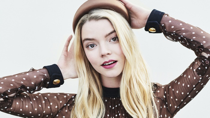 Anya Taylor-Joy wearing a polka dot dress and hat