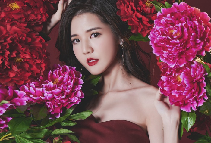 Woman with Black Hair and Flowers