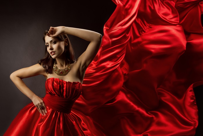Woman in Elegant Red Dress with Necklace 4K
