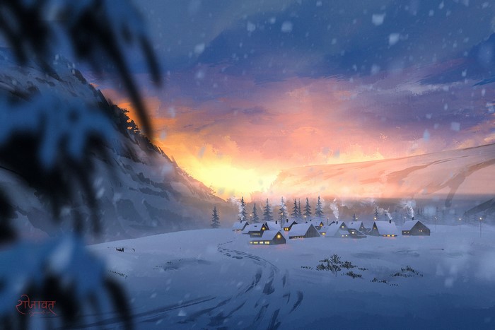 Snowy village at sunset with mountain backdrop