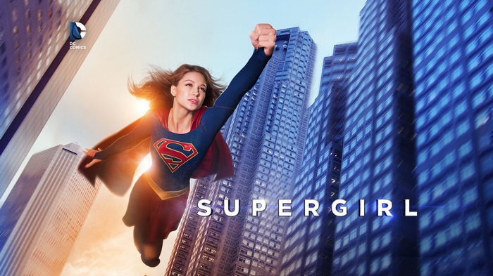 Supergirl from DC Comics flying over a city