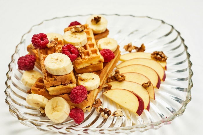Waffles with Bananas, Raspberries, Apples, and Walnuts