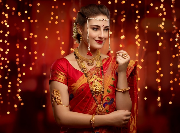 Indian Woman in Traditional Red Saree with Jewelry