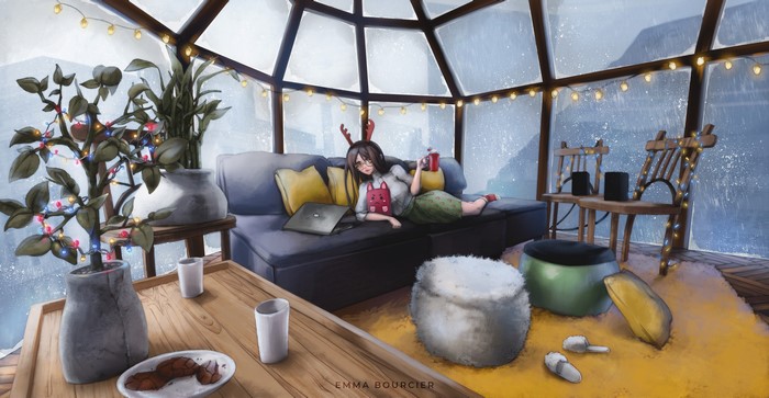 Girl with reindeer antlers in a cozy room with Christmas lights