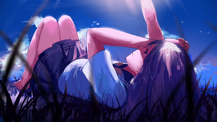 Girl lying in grass under moonlight