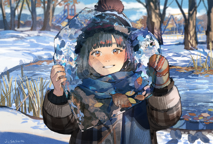 Girl holding ice in a snowy park
