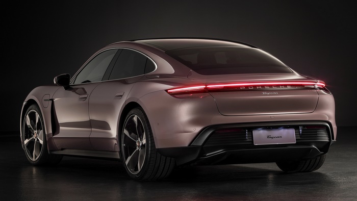 Rear view of a brown 2020 Porsche Taycan electric sedan