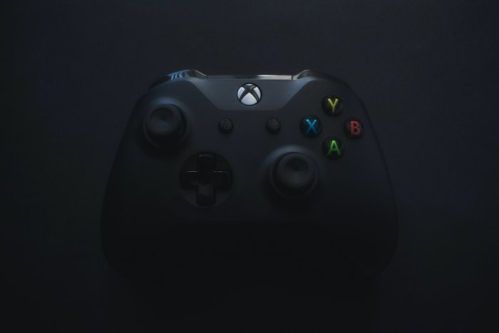 Black Xbox controller on a dark background