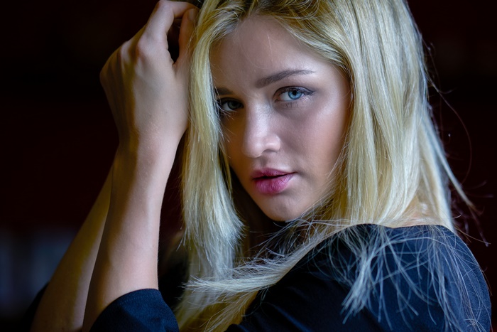 Woman with blonde hair and blue eyes