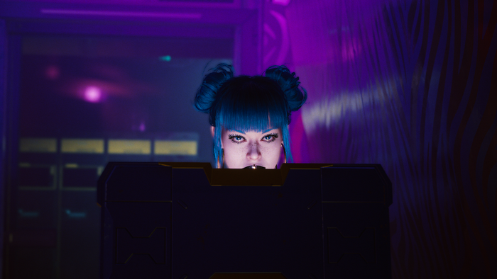 Blue-haired woman in cyberpunk setting
