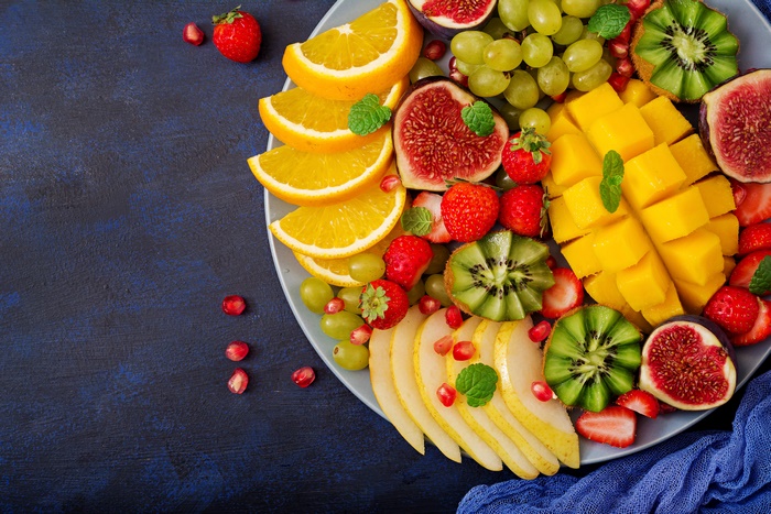 Fruit Platter with Oranges, Grapes, Strawberries, Mango, Kiwi, Figs, and Pears