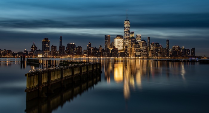 New York City Skyline at Night with Reflections