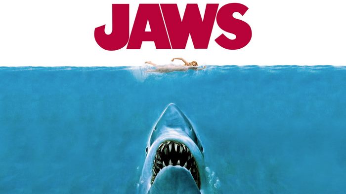 Jaws movie poster with shark and swimmer