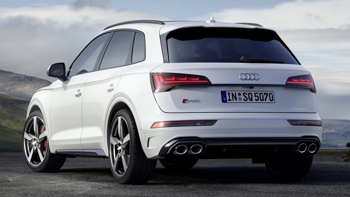 White Audi SQ5 parked on a rocky surface