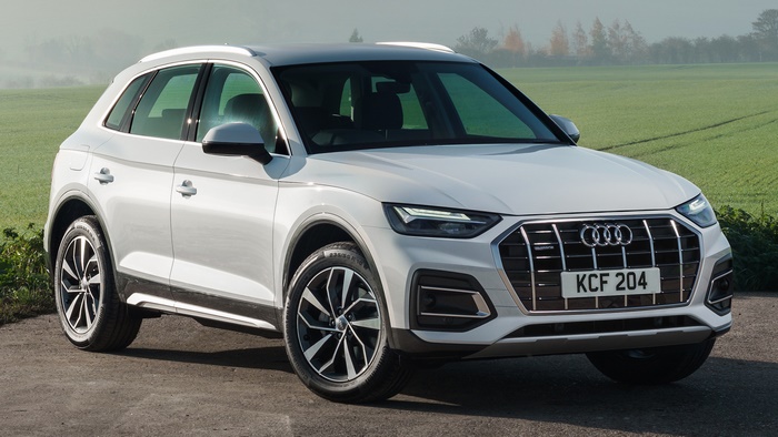 White Audi Q5 40 TDI SUV parked on a dirt road