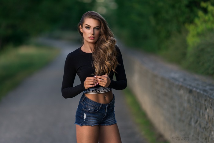 Brunette Woman in Denim Shorts Outdoors