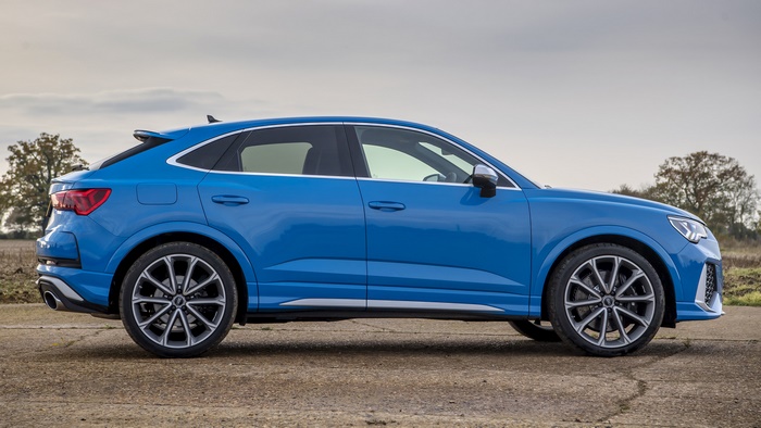 Blue Audi RS Q3 Sportback parked on a road