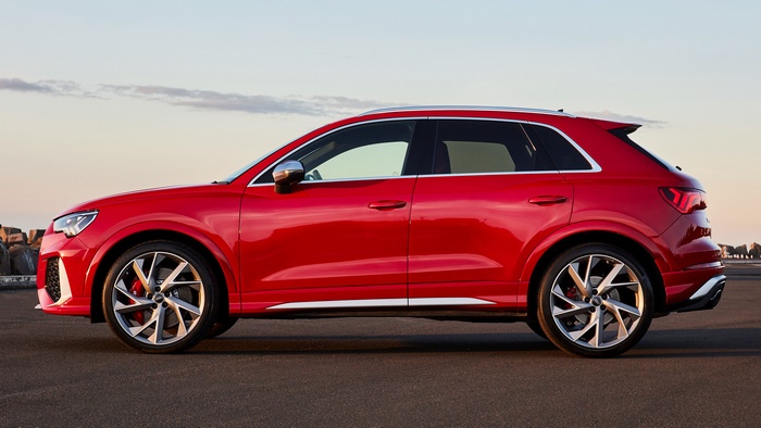 Red 2020 Audi RS Q3 parked on asphalt