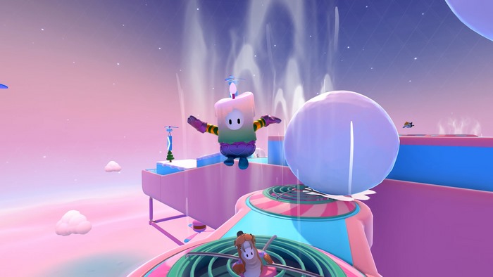 Fall Guys characters on a colorful obstacle course