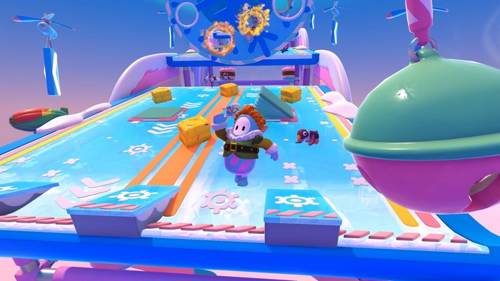 Fall Guys character on a colorful obstacle course