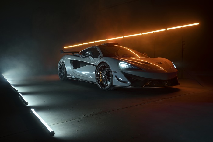 White McLaren Sports Car with Orange and Blue Lights