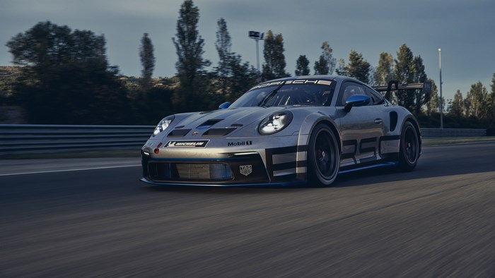 Silver Porsche 911 GT3 R Race Car on Track