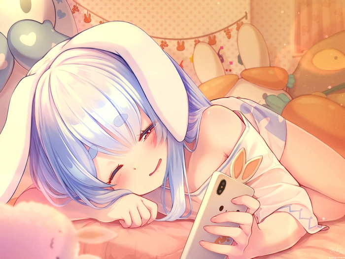 Usada Pekora relaxing with a phone
