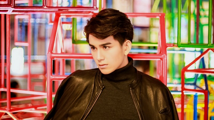 Zhu Zanjin in black turtleneck and leather jacket