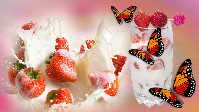 Strawberries and milk splash with butterflies