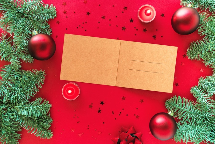 Christmas postcard with ornaments and candles