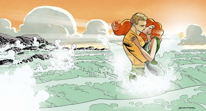 Aquaman and Mera kissing in the ocean waves