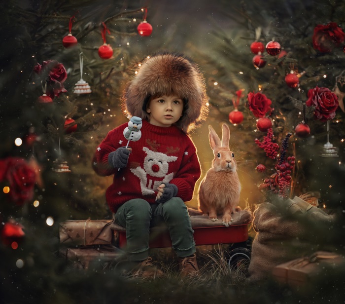 Child with rabbit and Christmas tree