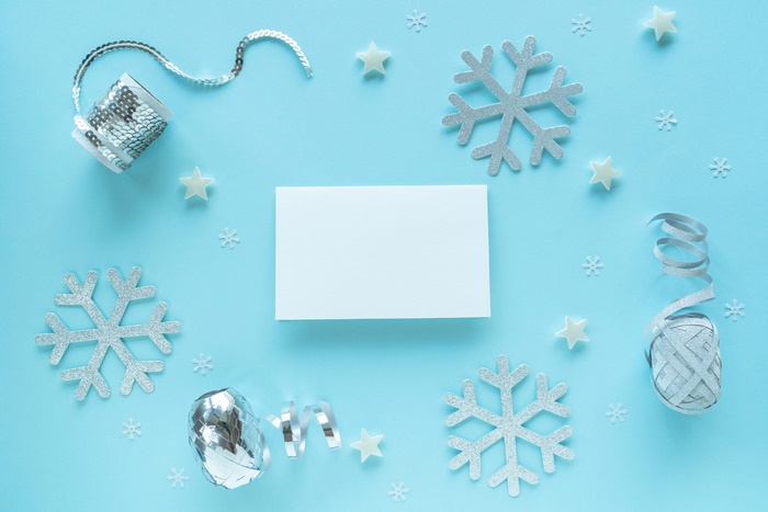 Christmas Ornaments and Snowflakes on Blue Background