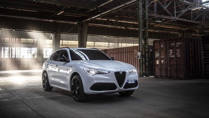 White Alfa Romeo Stelvio SUV in warehouse