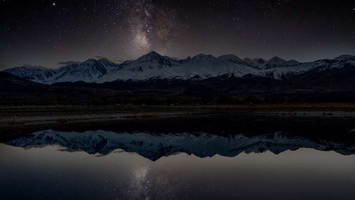 Snowy Mountains and Milky Way Reflected in Lake at Night 4K