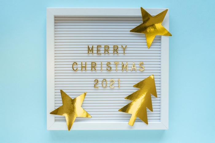 Merry Christmas 2021 letter board with gold stars and tree