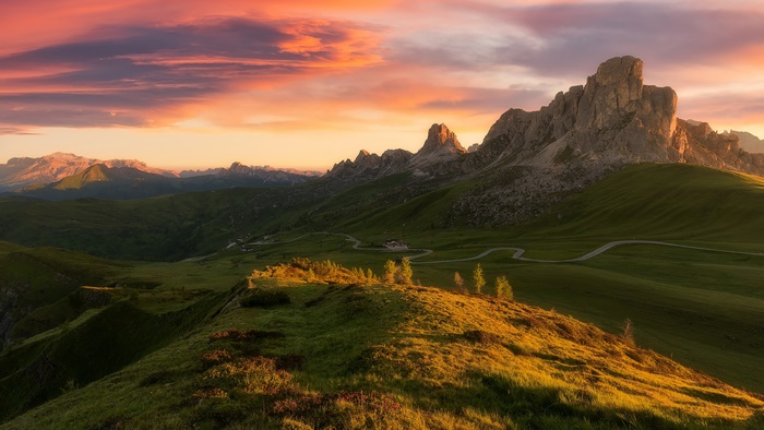 Mountain landscape at dawn with dramatic clouds