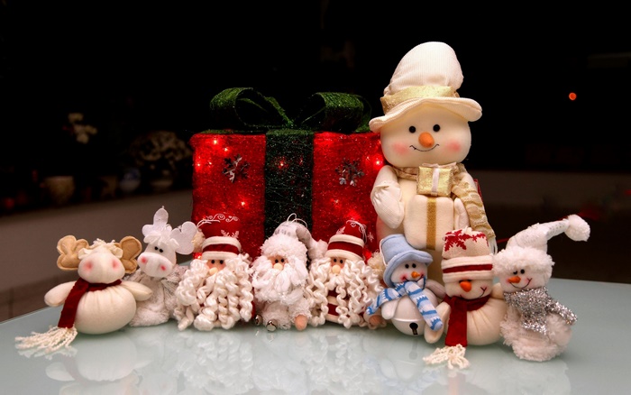 Christmas toys: Snowman, Santa, reindeer, and gift box