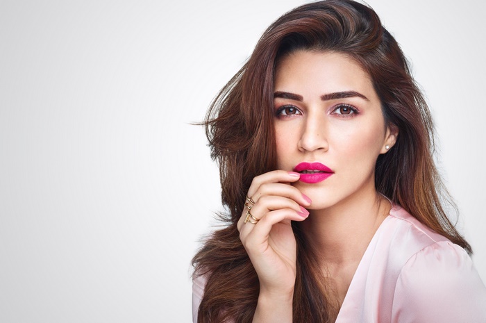 Kriti Sanon with pink lipstick and pink top