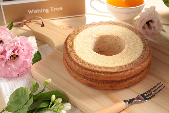 Baumkuchen cake with flowers and tea